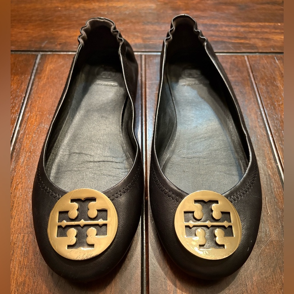 Tory Burch Black Flats with Gold Emblem - Picture 2 of 9